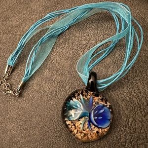 Gold and blue glass blown necklace. Hand made glass.